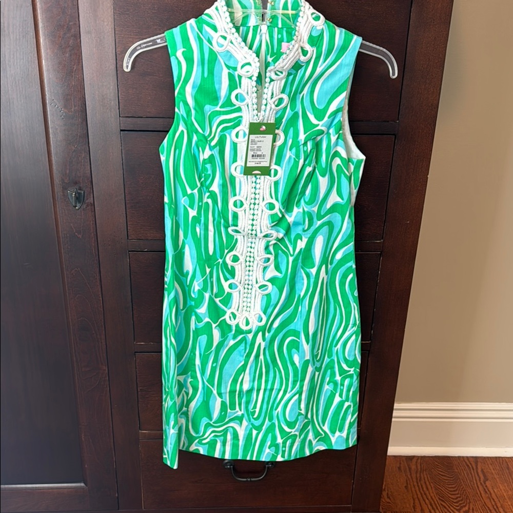 Vibrant Green and Blue Patterned Dress with White Accents